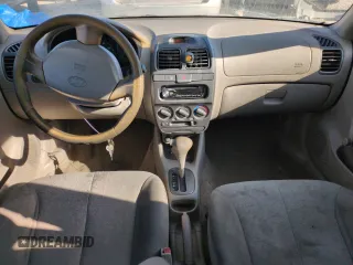 2000 Hyundai Accent z VIN KMHCG45G0YU084004, wystawiony jako Copart lot #42980585 z przebiegiem 167 545 mil mil oraz Czysty tytuł • Clean title. Historia ofert i sprzedaży dostępna na DreamBid. Obrazek 8.