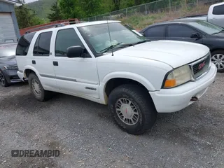 1999 GMC Jimmy SLE with VIN 1GKDT13WXX2521082, listed as a IAAI auction lot 42079903 with 160,055 mi miles. Bid and sale history available at carsss.com. Image 1.
