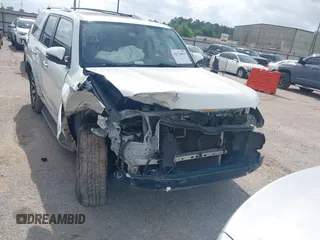 2014 Toyota 4Runner SR5 with VIN JTEZU5JR7E5080554, listed as a IAAI auction lot 42134833 with 170,077 mi miles and . Bid and sale history available at DreamBid. Image 6.