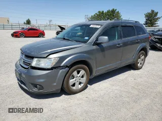 2012 Dodge Journey SXT z VIN 3C4PDDBG0CT345864, wystawiony jako Copart lot #55453875 z przebiegiem 142 444 mil mil oraz Szkoda całkowita • Salvage title. Historia ofert i sprzedaży dostępna na DreamBid. Obrazek 1.