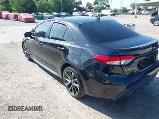 2021 Toyota Corolla SE with VIN JTDS4MCE5MJ056494, listed as a IAAI auction lot 41936866 with 128,257 mi miles. Bid and sale history available at carsss.com. Image 3.
