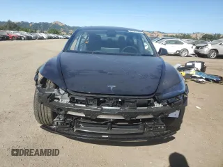 2025 Tesla Model 3 Long Range with VIN 5YJ3E1EA4SF978477, listed as a Copart auction lot 58525905 with 1,531 mi miles and Salvage title. Bid and sale history available at DreamBid. Image 5.