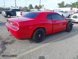 2011 Dodge Challenger with VIN 2B3CJ4DG6BH575065, listed as a IAAI auction lot 41804599 with 233,373 mi miles. Bid and sale history available at carsss.com. Image 4.