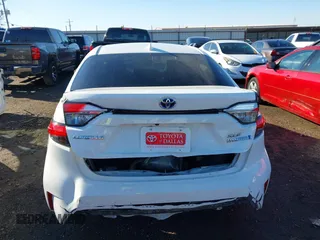 2023 Toyota Corolla Hybrid LE with VIN JTDBCMFE1PJ011085, listed as a IAAI auction lot 41340297 with 34,437 mi miles. Bid and sale history available at carsss.com. Image 17.