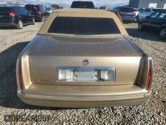1999 Cadillac DeVille DHS z VIN 1G6KE54Y5XU721363, wystawiony jako Copart lot #79227924 z przebiegiem Nie podano mil oraz Szkoda całkowita • Salvage title. Historia ofert i sprzedaży dostępna na DreamBid. Obrazek 6.