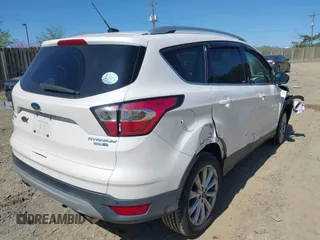 2017 Ford Escape Titanium with VIN 1FMCU9J96HUE21191, listed as a IAAI auction lot 42006013 with 71,786 mi miles. Bid and sale history available at carsss.com. Image 4.