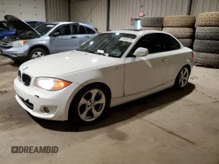 2012 BMW 1 Series 128i with VIN WBAUP9C58CVL91704, listed as a Copart auction lot 51833175 with 88,129 mi miles and Clean title. Bid and sale history available at DreamBid. Image 1.