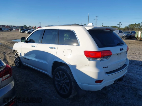 2017 Jeep Grand Cherokee Overland with VIN 1C4RJFCG8HC641729, listed as a IAAI auction lot 41233125 with 116,874 mi miles. Bid and sale history available at carsss.com. Image 14.