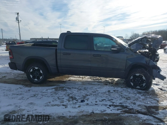 2022 Ram 1500 Rebel z VIN 1C6SRFLT9NN204868, wystawiony jako IAAI lot #41351273 z przebiegiem 67 120 mil mil oraz . Historia ofert i sprzedaży dostępna na DreamBid. Obrazek 13.