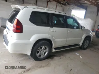 2006 Lexus GX 470 z VIN JTJBT20X060110741, wystawiony jako Copart lot #56944755 z przebiegiem 234 412 mil mil oraz Tytuł czysty. Historia ofert i sprzedaży dostępna na DreamBid. Obrazek 3.