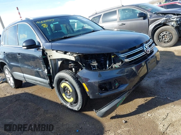 2017 Volkswagen Tiguan Wolfsburg Edition z VIN WVGSV7AXXHK007144, wystawiony jako IAAI lot #41810979 z przebiegiem 125 363 mil mil oraz . Historia ofert i sprzedaży dostępna na DreamBid. Obrazek 1.