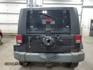 2009 Jeep Wrangler Rubicon with VIN 1J4GA64159L770895, listed as a Copart auction lot 82140864 with 209,464 mi miles and Salvage Title. Bid and sale history available at DreamBid. Image 6.