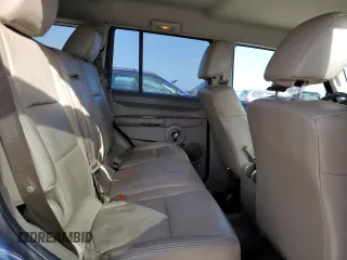 2010 Jeep Commander Sport z VIN 1J4RH4GK9AC122462, wystawiony jako Copart lot #85060484 z przebiegiem 178 901 mil mil oraz Szkoda całkowita • Salvage title. Historia ofert i sprzedaży dostępna na DreamBid. Obrazek 11.