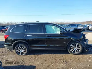 2016 Honda Pilot Elite with VIN 5FNYF6H01GB050524, listed as a IAAI auction lot 41452563 with 140,326 mi miles. Bid and sale history available at carsss.com. Image 13.