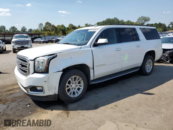 2019 GMC Yukon XL SLT with VIN 1GKS1GKCXKR239712, listed as a Copart auction lot 74721584 with 143,690 mi miles and Salvage Title. Bid and sale history available at carsss.com. Image 1.