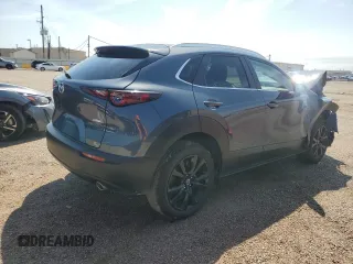 2025 Mazda CX-30 S Carbon Edition z VIN 3MVDMBCM5SM773318, wystawiony jako Copart lot #55027585 z przebiegiem 7 213 mil mil oraz Nie do naprawy • Non repairable. Historia ofert i sprzedaży dostępna na DreamBid. Obrazek 3.