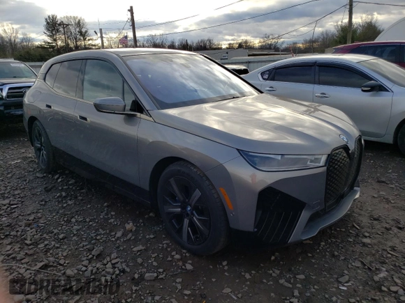 2023 BMW iX xDrive50 with VIN WB523CF03PCL64040, listed as a Copart auction lot 36400593 with 1,399 mi miles. Bid and sale history available at carsss.com. Image 4.