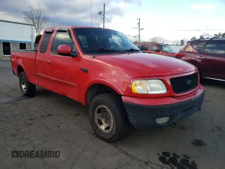 2000 Ford F-150 XL with VIN 1FTRX18W6YNC32005, listed as a Copart auction lot 82169314 with 289,320 mi miles and Salvage Title. Bid and sale history available at carsss.com. Image 4.