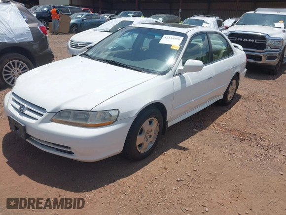 2002 Honda Accord EX z VIN 1HGCG16592A037760, wystawiony jako IAAI lot #42334100 z przebiegiem 271 805 mil mil oraz . Historia ofert i sprzedaży dostępna na DreamBid. Obrazek 2.
