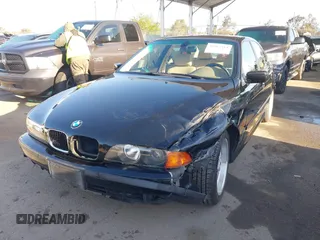 2000 BMW 5 Series 528iA with VIN WBADM6343YGU12629, listed as a IAAI auction lot 41963814 with 206,922 mi miles. Bid and sale history available at carsss.com. Image 17.