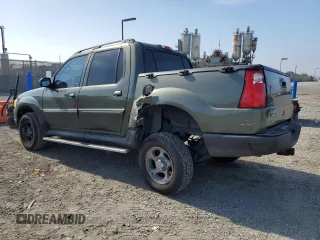 2004 Ford Explorer Sport Trac XLS with VIN 1FMZU67K64UA39174, listed as a Copart auction lot 61035465 with 196,912 mi miles and Salvage title. Bid and sale history available at DreamBid. Image 2.