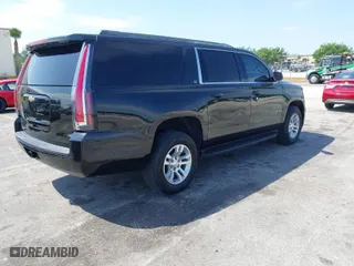2018 Chevrolet Suburban LT with VIN 1GNSCHKC7JR111560, listed as a IAAI auction lot 41823175 with 136,751 mi miles. Bid and sale history available at carsss.com. Image 4.