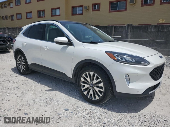 2020 Ford Escape Titanium Hybrid with VIN 1FMCU9DZ0LUB95931, listed as a Copart auction lot 59876815 with 67,932 mi miles and Salvage title. Bid and sale history available at DreamBid. Image 4.