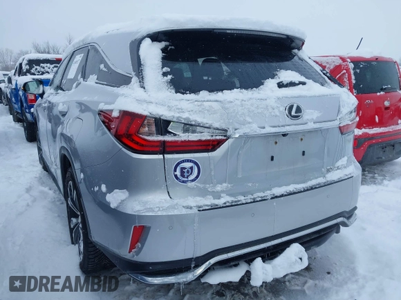 2018 Lexus RX 350L Premium z VIN JTJDZKCA9J2008933, wystawiony jako IAAI lot #41600527 z przebiegiem 93 423 mil mil oraz . Historia ofert i sprzedaży dostępna na DreamBid. Obrazek 3.