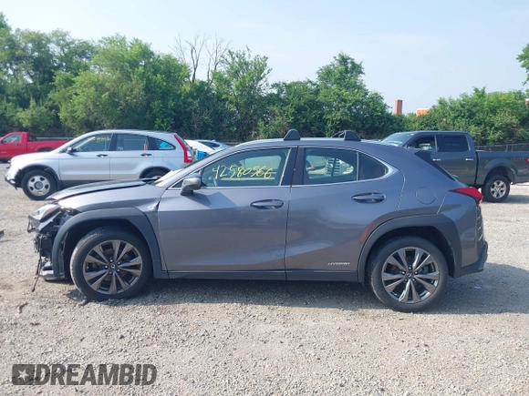2021 Lexus UX 250h F Sport z VIN JTHE9JBHXM2045377, wystawiony jako IAAI lot #42580566 z przebiegiem 52 838 mil mil oraz . Historia ofert i sprzedaży dostępna na DreamBid. Obrazek 15.