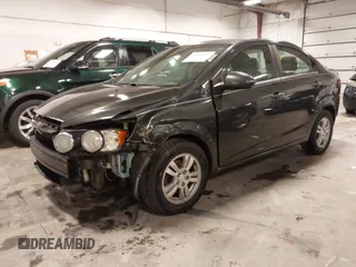 2015 Chevrolet Sonic LT with VIN 1G1JC5SH4F4163515, listed as a IAAI auction lot 41962147 with 133,104 mi miles and . Bid and sale history available at DreamBid. Image 23.