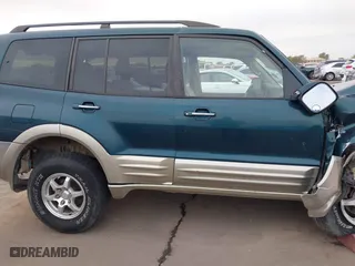 2002 Mitsubishi Montero LTD with VIN JA4MW51RX2J040586, listed as a IAAI auction lot 41566077 with 149,851 mi miles. Bid and sale history available at carsss.com. Image 13.