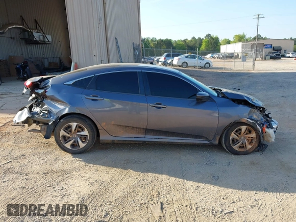 2020 Honda Civic LX with VIN 2HGFC2F67LH534381, listed as a IAAI auction lot 42056676 with 124,344 mi miles and . Bid and sale history available at DreamBid. Image 14.