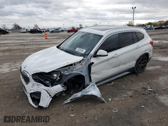 2022 BMW X1 xDrive28i with VIN WBXJG9C0XN5U63096, listed as a Copart auction lot 79253954 with 17,311 mi miles and Salvage title. Bid and sale history available at DreamBid. Image 1.