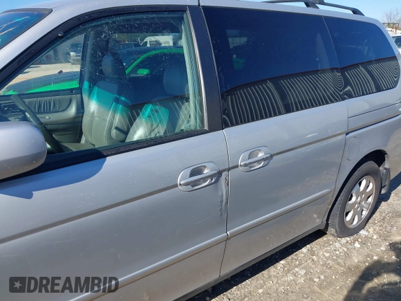 2004 Honda Odyssey EX-L with VIN 5FNRL18974B057715, listed as a IAAI auction lot 41762518 with 193,626 mi miles and . Bid and sale history available at DreamBid. Image 12.