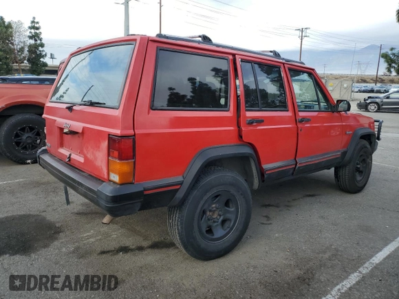 1996 Jeep Cherokee Sport with VIN 1J4FT68S8TL232241, listed as a Copart auction lot 82170904 with 287,125 mi miles and Salvage Title. Bid and sale history available at carsss.com. Image 3.