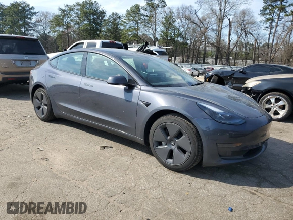 2023 Tesla Model 3 with VIN 5YJ3E1EA8PF699931, listed as a Copart auction lot 49293795 with 13,119 mi miles and Salvage Title. Bid and sale history available at DreamBid. Image 4.