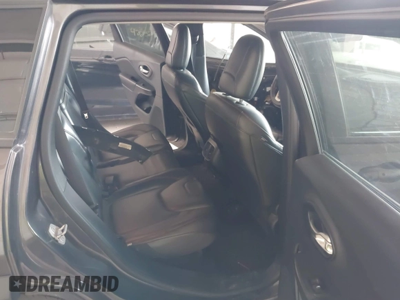 2016 Jeep Cherokee Trailhawk with VIN 1C4PJMBS0GW169184, listed as a IAAI auction lot 42255346 with 152,802 mi miles and . Bid and sale history available at DreamBid. Image 8.