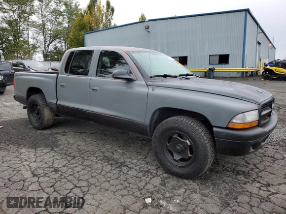 2003 Dodge Dakota Sport with VIN 1D7HL38N63S192308, listed as a Copart auction lot 77494684 with 128,512 mi miles and Salvage Title. Bid and sale history available at carsss.com. Image 4.