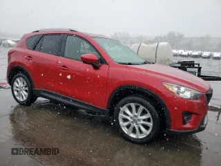 2014 Mazda CX-5 Grand Touring with VIN JM3KE4DY6E0309925, listed as a Copart auction lot 53521105 with 161,579 mi miles and Salvage Title. Bid and sale history available at carsss.com. Image 4.