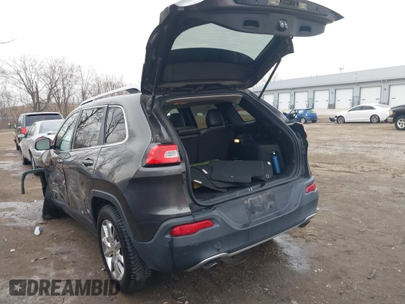 2014 Jeep Cherokee Limited with VIN 1C4PJMDS3EW137985, listed as a IAAI auction lot 41543651 with 131,312 mi miles. Bid and sale history available at carsss.com. Image 3.
