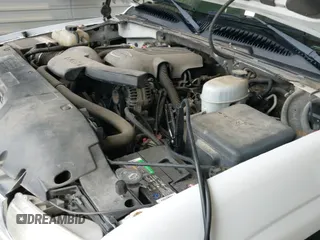 2005 Chevrolet Suburban Z71 z VIN 3GNFK16Z55G248593, wystawiony jako IAAI lot #42362738 z przebiegiem 215 711 mil mil oraz . Historia ofert i sprzedaży dostępna na DreamBid. Obrazek 13.