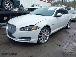 2014 Jaguar XF V6 SC with VIN SAJWJ0EF9E8U32052, listed as a IAAI auction lot 41542500 with 74,550 mi miles. Bid and sale history available at carsss.com. Image 2.