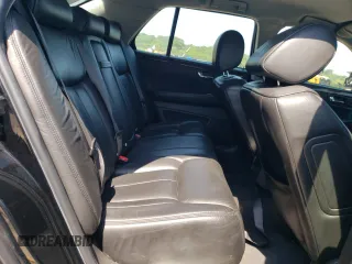 2008 Cadillac DTS 1SA z VIN 1G6KD57Y28U136336, wystawiony jako Copart lot #64738033 z przebiegiem 189 496 mil mil oraz Szkoda całkowita • Salvage title. Historia ofert i sprzedaży dostępna na DreamBid. Obrazek 10.