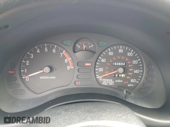 1999 Mitsubishi 3000GT GT z VIN JA3AM84J4XY001608, wystawiony jako Copart lot #64366944 z przebiegiem 153 804 mil mil oraz Tytuł czysty. Historia ofert i sprzedaży dostępna na DreamBid. Obrazek 9.
