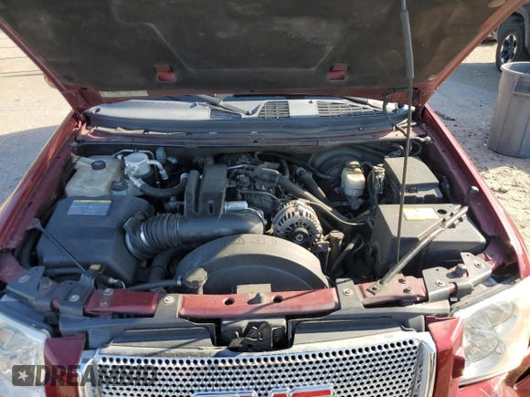 2006 GMC Envoy Denali z VIN 1GKES66M266119739, wystawiony jako Copart lot #48015465 z przebiegiem 159 822 mil mil oraz Szkoda całkowita • Salvage title. Historia ofert i sprzedaży dostępna na DreamBid. Obrazek 12.