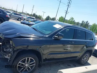2018 Jeep Grand Cherokee Laredo E z VIN 1C4RJEAG9JC131344, wystawiony jako IAAI lot #42218060 z przebiegiem 126 639 mil mil oraz . Historia ofert i sprzedaży dostępna na DreamBid. Obrazek 15.