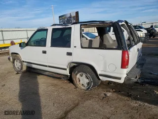 1999 Chevrolet Tahoe with VIN 1GNEC13RXXJ519095, listed as a Copart auction lot 43254645 with 176,861 mi miles and Salvage Title. Bid and sale history available at carsss.com. Image 2.