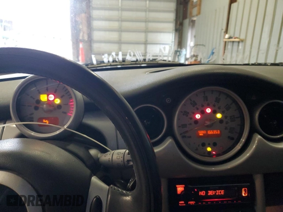 2002 MINI Hardtop with VIN WMWRC33452TC35333, listed as a Copart auction lot 44447425 with 166,353 mi miles and Salvage Title. Bid and sale history available at DreamBid. Image 9.