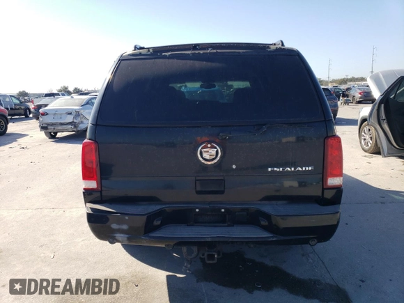 2004 Cadillac Escalade z VIN 1GYEC63T54R139039, wystawiony jako Copart lot #86274414 z przebiegiem 267 218 mil mil oraz Czysty tytuł • Clean title. Historia ofert i sprzedaży dostępna na DreamBid. Obrazek 7.