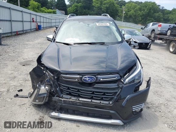 2024 Subaru Forester Touring with VIN JF2SKAMC4RH474711, listed as a Copart auction lot 59582405 with 5,373 mi miles and Salvage title. Bid and sale history available at DreamBid. Image 5.